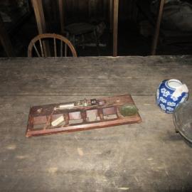 2015-16 Artefacts on Wardroom table, Scott's 'Terra Nova' hut (002)
