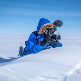 Laura Andrews filming during the South Pole Expedition