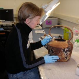 AHT Conservator Nicola Dunn treating kettle