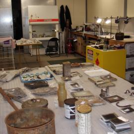 Artefacts on table in Conservation lab (003)