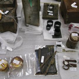 Artefacts on table in Conservation lab (001)