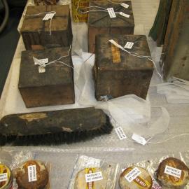 Artefacts on table in Conservation lab (003)