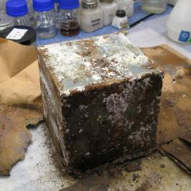 Griffiths McAllister tin and wrapper before treatment