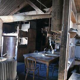 2018-19 Wardroom table inside Scott's 'Terra Nova' hut, Cape Evans