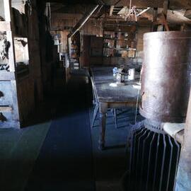 2018-19 Wardroom table inside Scott's 'Terra Nova' hut, Cape Evans