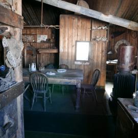 2018-19 Wardroom table inside Scott's 'Terra Nova' hut, Cape Evans