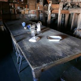 2018-19 Wardroom table inside Scott's 'Terra Nova' hut, Cape Evans