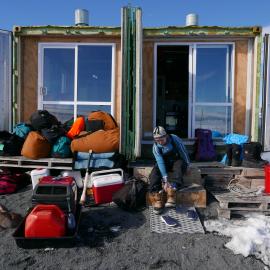 2018-19 Nicola Stewart outside the field camp container, Cape Evans