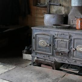2018-19 Mrs Sam stove inside Shackleton's 'Nimrod' hut, Cape Royds