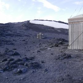 2018-19 Venesta cases stacked outside Shackleton's 'Nimrod' hut, Cape Royds