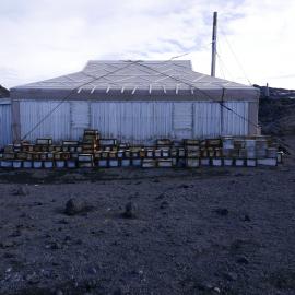 2018-19 Venesta cases stacked outside Shackleton's 'Nimrod' hut, Cape Royds