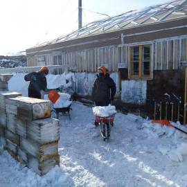 Snow removal at Shackleton's 'Nimrod' hut