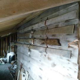 Skis on wall in Western Annexe, Scott's 'Terra Nova' hut (001)