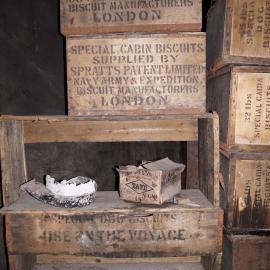 Improvised shelves and biscuit boxes
