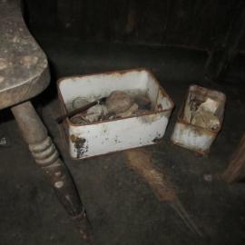 Artefacts under geology bench, Scott's 'Terra Nova' hut (001)