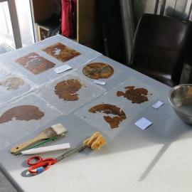 2013-14 Paper artefacts being conserved in the field camp, Cape Evans (001)