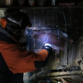 2013-14 Josiah Wagener treating fixtures inside Scott's 'Terra Nova' hut, Cape Evans