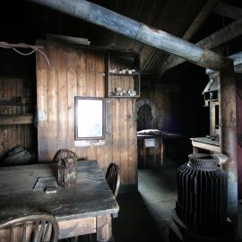 Wardroom table and stove, Scott's 'Terra Nova' hut