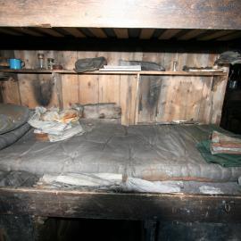 Mattress and pillow on Day's bunk, Scott's 'Terra Nova' hut 