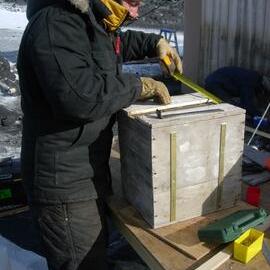 Heritage Carpenter Bryce Lewis repairing boxes from stables wall (002)