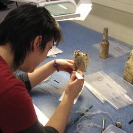 AHT Conservator Lizzie Meek treating a bottle of Savoy Sauce (001)