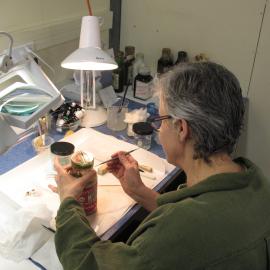 AHT Conservator Therese Charbonneau treating a bottle of pickles (001)