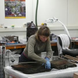 AHT Conservator Carla Pike treating artefact (001)