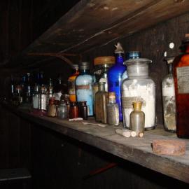 Medicines on shelf in Wilson and Evans corner, Scott's 'Terra Nova' Hut 
