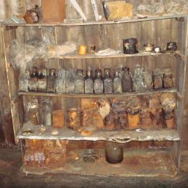 Artefacts on the messdeck shelves, Scott's 'Terra Nova' Hut (001)