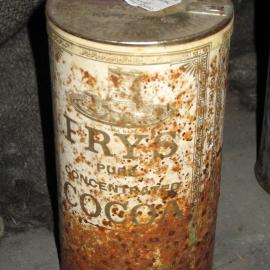 Corroded tin of 'Fry's' Cocoa with coating applied, Scott's 'Discovery' Hut
