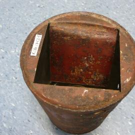 Corroded tin with incision