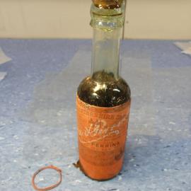 Unfolding wrapper on bottle (004)