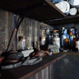 2017-18 Scott's 'Terra Nova' hut, interior, medicines on shelving