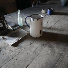 2017-18 Scott's 'Terra Nova' hut, interior, Wardroom table artefacts
