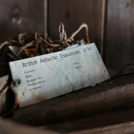 2017-18 Scott's 'Terra Nova' hut, interior, British Antarctic Expedition tag