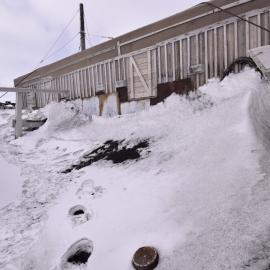 2017-18 Shackleton's 'Nimrod' hut, exterior, snow build-up in Stables