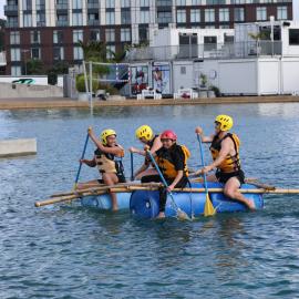 2023 Students and Inspiring Explorers paddle a completed raft