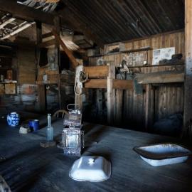 2018-19 Wardroom table inside Scott's 'Terra Nova' hut, Cape Evans