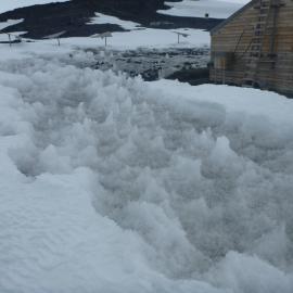 Scoria spread on snow, Scott's 'Terra Nova' hut (003)