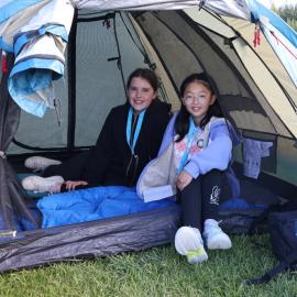 Young Inspiring Explorers with their pitched tent