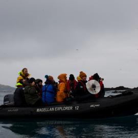 Inspiring Explorers and passengers in a zodiac, Elsehul Bay