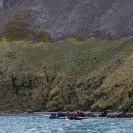 Inspiring Explorers and passengers in a Zodiac, Elsehul Bay