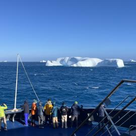 Inspiring Explorers watch icebergs from the 'Magellan Explorer'