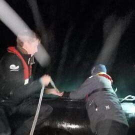 Inspiring Explorers taking Mangōpare Temperature Sensor measurements from a zodiac (003)