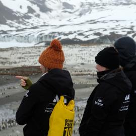 Inspiring Explorers look over the King penguin colony, South Georgia