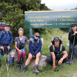 Group photo at Department of Conservation sign (001)