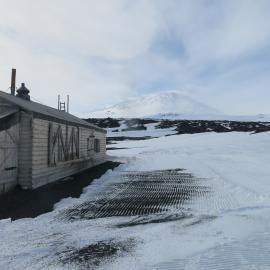 2014-15 Scott's 'Terra Nova' hut, scoria on snow, South side