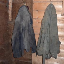 2010-11 Two jackets hanging inside Shackleton's 'Nimrod' hut
