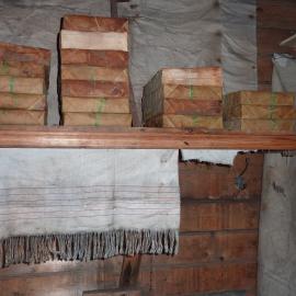 2010-11 Reams of paper stacked on shelves inside Shackleton's 'Nimrod' hut