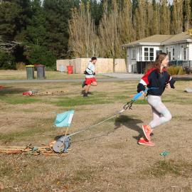 Young Inspiring Explorers race their sleds (006)